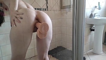 Fappking.com | Inked up whore masturbating by riding a suction dildo stuck to the see through shower door |close ups